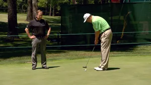 Loren Roberts Giving Putting Stroke Advice Wallpaper