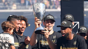 Los Angeles Fc Gareth Bale Holding The Championship Trophy Wallpaper