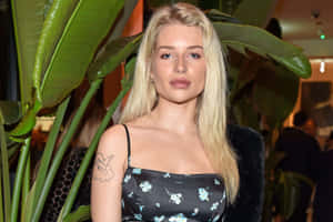 Lottie Moss Dazzles In Elegant Evening Attire Wallpaper