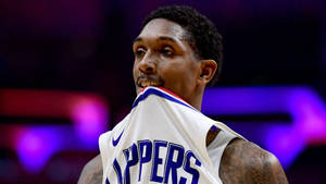 Lou Williams Bitting His Jersey Wallpaper