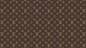Louis Vuitton Monogram Pattern In Brown And Gold Wallpaper