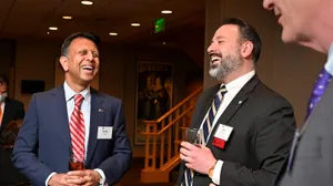 Louisiana Governor Bobby Jindal Sharing A Laugh With Other Governors Wallpaper