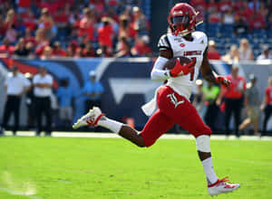 Louisville Football Player Running Action Wallpaper