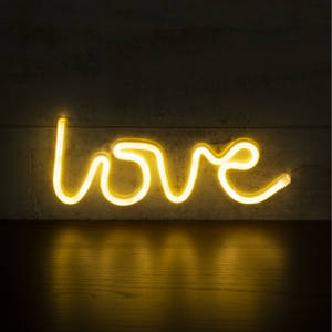 Love On Neon Yellow Text Wallpaper