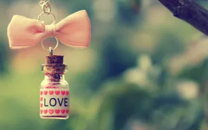 Love Potion Charm Pendant Wallpaper