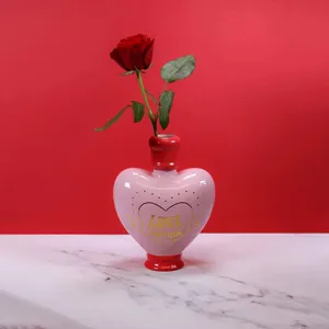 Love Potion Vasewith Red Rose Wallpaper