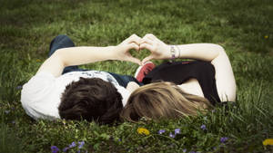 Love Story Of Lovers On Field Wallpaper