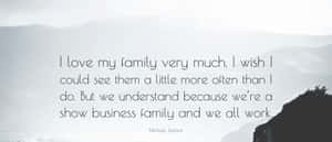 Loving Family Embrace During Sunset Wallpaper