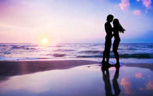 Loving Hug Of A Cute Boyfriend And Girlfriend Wallpaper