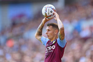 Lucas Digne Holding Ball With Two Hands Wallpaper