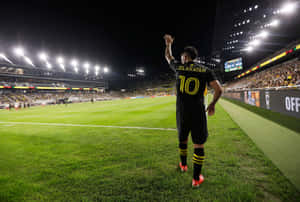 Lucas Zelarayan On A Massive Football Field Wallpaper