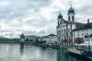 Lucerne Jesuit Churchand Chapel Bridge Wallpaper