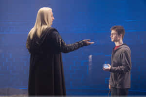 Lucius Malfoy Confronting Harry Potter Wallpaper