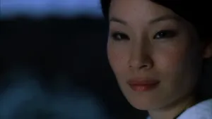 Lucy Liu Poses For A Closeup Photograph Wallpaper