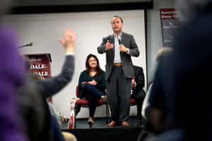 Luis Gutiérrez Speaking In Front Wallpaper