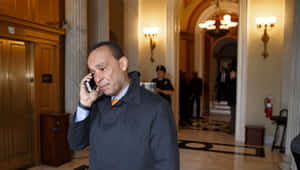 Luis Gutiérrez Talking On Phone Wallpaper