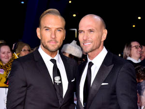 Luke Goss And Matt Goss In Suits Wallpaper