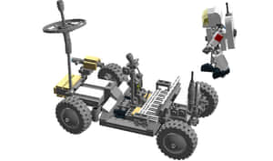 Lunar Rover Exploring The Moon's Surface Wallpaper