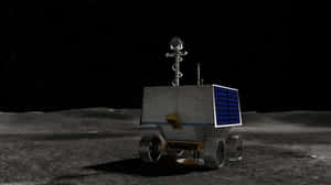 Lunar Rover Exploring The Moon's Surface Wallpaper