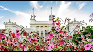 Lund_ University_ Main_ Building_ Behind_ Flowers.jpg Wallpaper