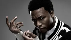 Lupe Fiasco Hand Gesture Portrait Wallpaper