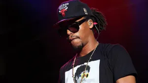 Lupe Fiasco Performance Stage Presence Wallpaper