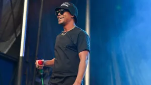 Lupe Fiasco Performing Live Onstage Wallpaper