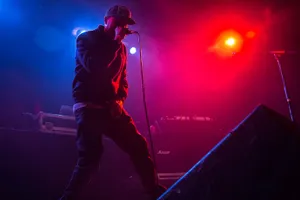 Lupe Fiasco Performing Liveon Stage Wallpaper