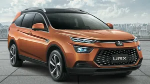 Luxgen U6 Turbo Suv In Urban Setting Wallpaper