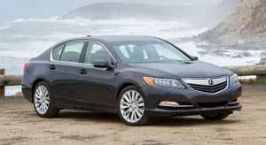 Luxurious Acura Rlx In A Stunning City Night Scene Wallpaper