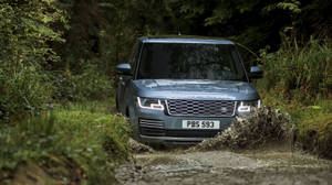 Luxurious Adventure Awaits In This Metallic Gray Land Rover Wallpaper