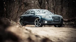 Luxurious Audi S6 In Spectacular Night View Wallpaper