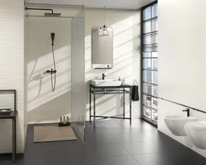 Luxurious Bathroom With Polished Black Floor Tiles Wallpaper