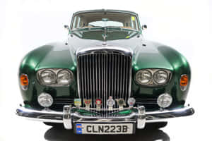 Luxurious Bentley S3 In A Stunning Landscape Wallpaper