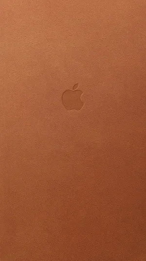 Luxurious Bronze Leather Background With Apple Logo Wallpaper