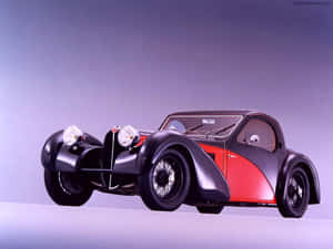 Luxurious Bugatti Type 57sc Atlantic Gliding In Elegance Wallpaper