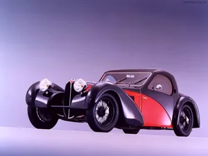 Luxurious Bugatti Type 57sc Atlantic Gliding In Elegance Wallpaper