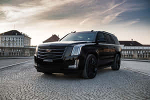 Luxurious Cadillac Escalade On The Road Wallpaper