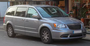 Luxurious Chrysler Voyager In Motion Wallpaper