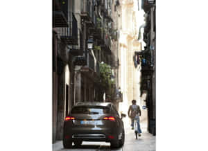 Luxurious Citroen Ds4 In Striking Red Color Cruising In Nature. Wallpaper