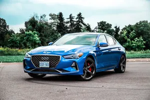 Luxurious Genesis G70 Sports Sedan In Action Wallpaper