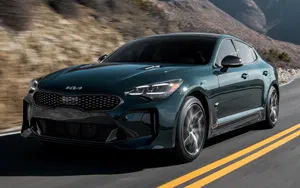 Luxurious Kia Stinger In Motion Wallpaper