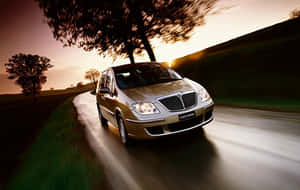 Luxurious Lancia Phedra In Stunning Display Wallpaper