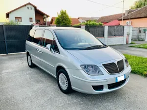 Luxurious Lancia Phedra In Sunlight Wallpaper