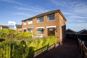 Luxurious Living Room In A Modern Household Wallpaper