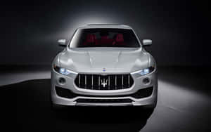 Luxurious Maserati Levante Cruising The Streets Wallpaper