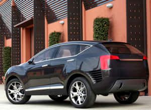 Luxurious Red Hongqi Car On City Street Wallpaper