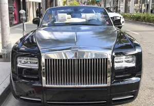 Luxurious Rolls Royce Phantom Drophead Coupe Showcasing Unparalleled Design Wallpaper