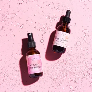 Luxurious Rose Oil In A Glass Dropper Bottle Wallpaper