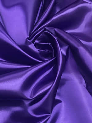 Luxuriously Textured Purple Satin Fabric Wallpaper